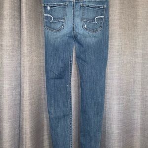 American Eagle Super Super Stretch X Jeans. High rise. Size: 8 Mid wash color
